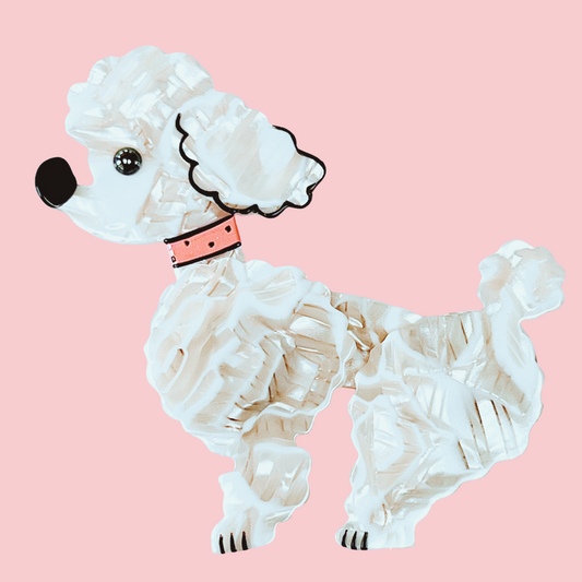 White with patterns Ari Poodle Dog Brooch with a pink necklace