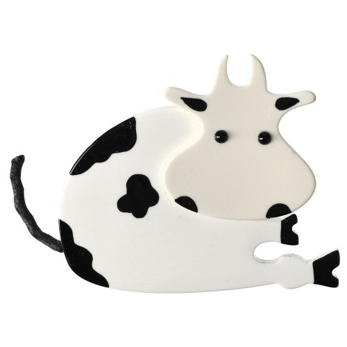 White and Black Lolo Sitting Cow Brooch