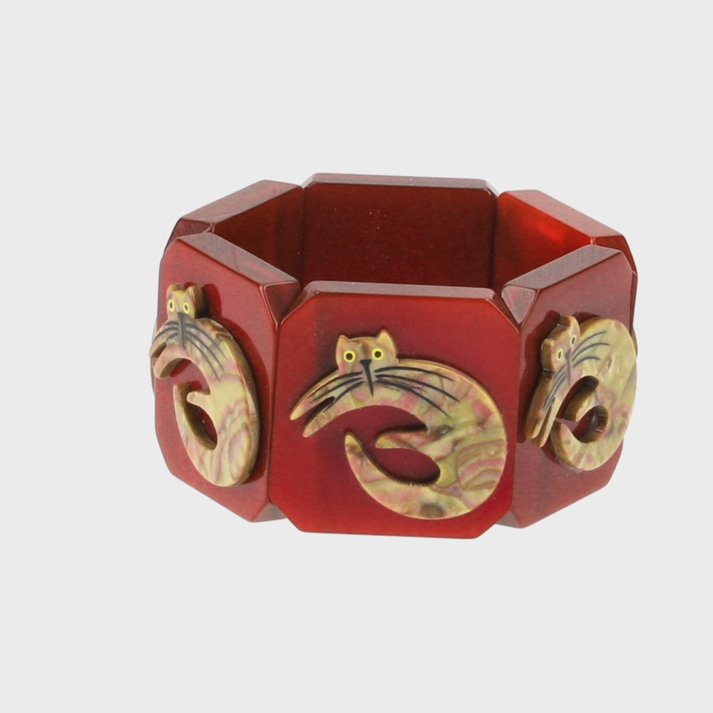 Ochre and Pink Lying Cat on Red Bracelet 