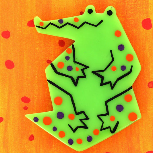 anise Sitting Crocodile Brooch in galalith