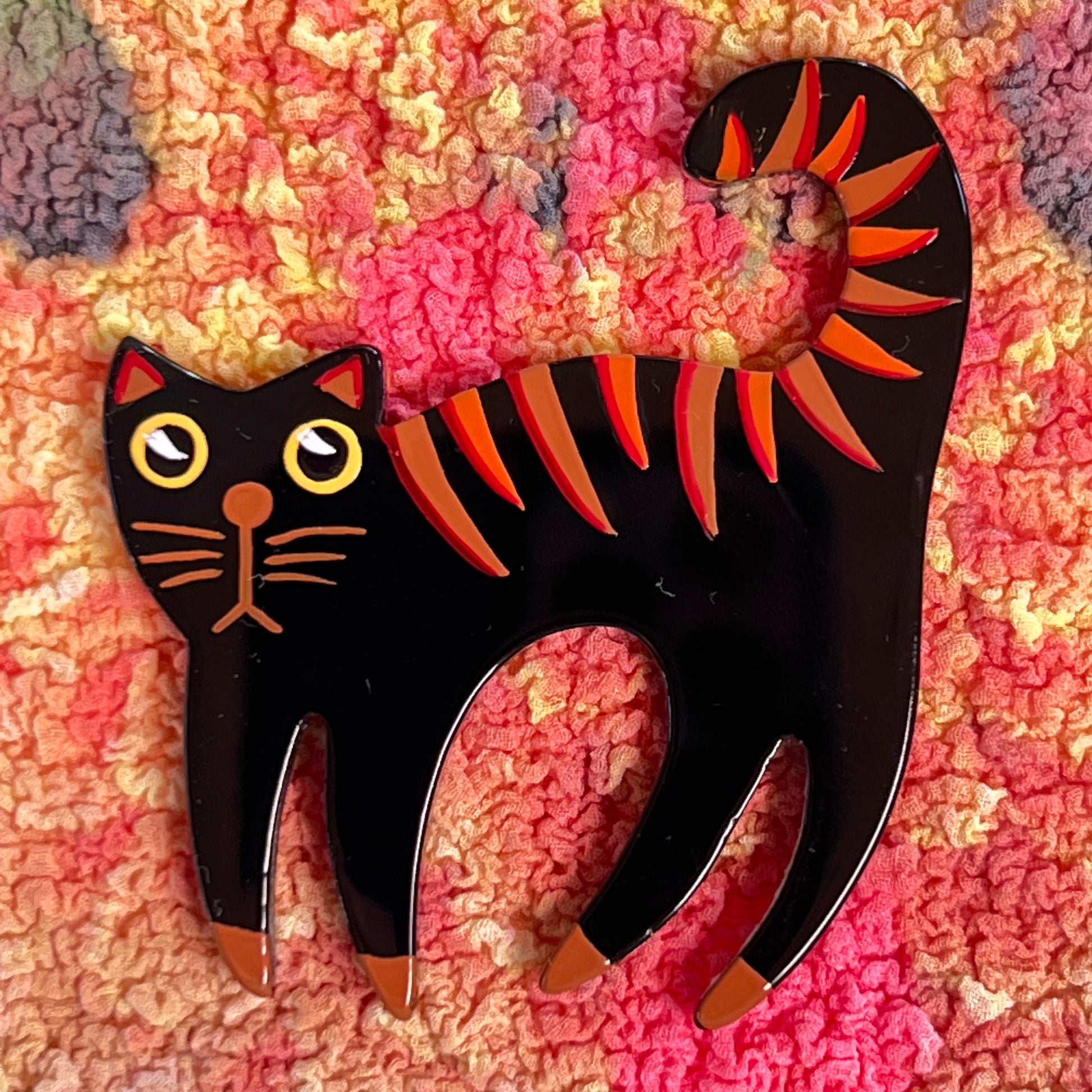 The Wilson Cat Brooch in its Black and Ginger Version in galalith