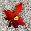 Small Ginger vine Leaf Brooch with a yellow ladybug